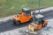 Two roller compactor machines during operation