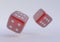 Two rolling dice, poker dice, ivories, bone, devil`s bones on white background