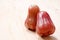 two rose apple on the wooden table