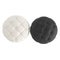 Two round beige and black pouf on a white background on top view. 3d rendering