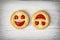 Two round biscuits smiling faces, humorous sweet food