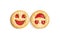 Two round biscuits smiling faces, humorous sweet food, isolated