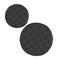 Two round quilted black leather poufs on an isolated background. 3d rendering
