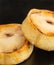 Two Round Scotch Pies on Black Slate Serving Tray