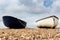 Two row boats moored on the foreshore