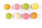 Two rows of colorful French macarons.