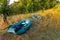 Two rubber boats with fishing tackle in the early morning during the fog, parked on the banks of the river