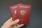 Two russian passports in hand