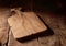 Two rustic wooden cheese boards