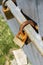 Two rusty old linked padlocks on a bridge beam as a symbol of love and fidelity