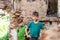 Two sad and unhappy brothers in a destroyed and abandoned building, staged photo