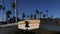 Two sailboat hulls frame a picturesque Santa Barbara Street 4K