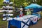 Two saleswomen sell Souvenirs with marine symbols