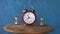 Two sandglass and vintage alarm-clock