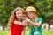 Two school girls exploring the nature