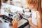 Two schoolgirls study in a robotics class, assemble a robot constructor