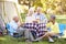 Two Senior Couples Enjoying Camping Holiday