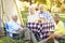 Two Senior Couples Enjoying Camping Holiday