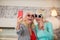 Two senior excited women making selfie and having fun