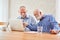 Two seniors at the laptop Computer in the retirement home