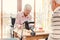 Two seniors in a nursing home playing a board game