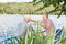 Two seniors together in the boat as anglers