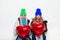 Two Serious Confused Girls Friends With Red Heart Shape Balloons Valentine Day