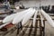 Two sets of freshly made blades for wind turbines in a factory floor