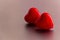 Two Shiny Red Hearts for Love and Valentines Background