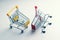 Two shopping carts - business metaphor - trade war, rivalry of markets, competition concept