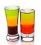 Two shot glasses with layered cocktails