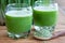 Two shots of fresh barley grass juice