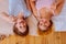 Two siblings laughing while feeling happy spending time together