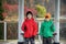 Two siblings stand on the bridge and admire the magnificent view