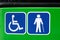 Two signs informing the public bus is suitable for people in wheelchairs and provides accessibility for blind persons