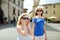 Two sisters exploring the famous Orvieto, a medieval hill town, rising above the almost-vertical faces of tuff cliffs and