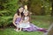 Two sisters friends chestnut brunette blue eyes woman girls posing together summer sunny day evening dressed in white purple airy