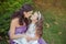 Two sisters friends chestnut brunette blue eyes woman girls posing together summer sunny day evening dressed in white purple airy