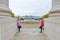 Two sisters in front of the Magic Fountain in Montjuic, Barcelona, Spain