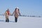 Two sisters go in the snow