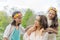 Two sisters with there mother bonding in a park