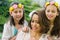 Two sisters with there mother bonding in a park