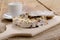 Two slice christmas stollen on a wooden board