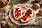 Two slices of traditional Czech sweet Easter cake called mazanec with butter and cranberry marmalade on a plate