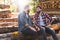 two smiling bearded lumberjacks talking to each other