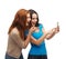 Two smiling teenagers with smartphone