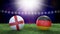 Two soccer balls in flags colors on stadium blurred background. England and Germany.