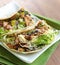 Two soft shell chicken tacos
