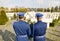 Two soldiers in ceremonial uniforms pay tribute to the victims of the war