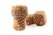 Two sparkling wine corks with grape images on white background